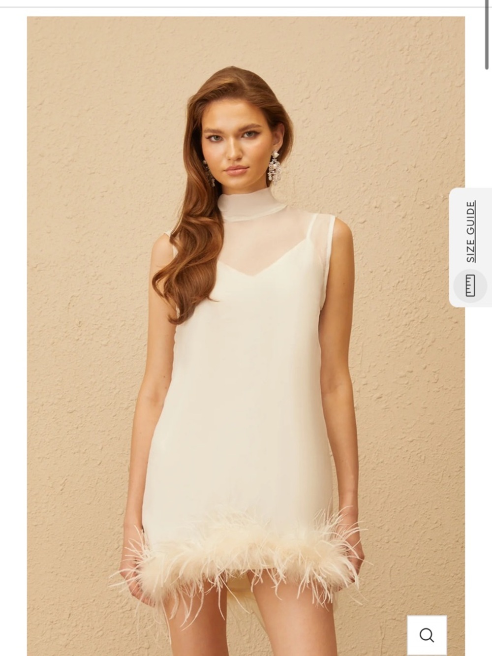 Sleeveless Feather-Hem Mini Dress in Cream